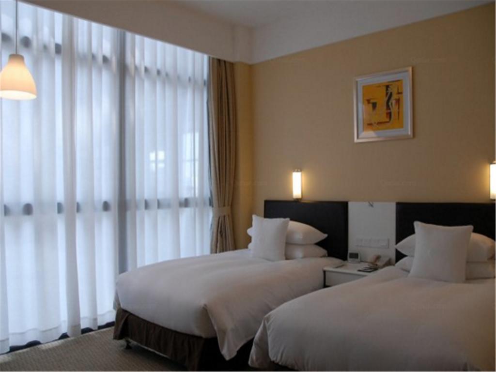 Gloria Plaza Hotel Kangqiao Шанхай Екстериор снимка