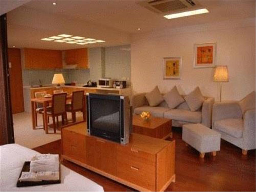 Gloria Plaza Hotel Kangqiao Шанхай Стая снимка