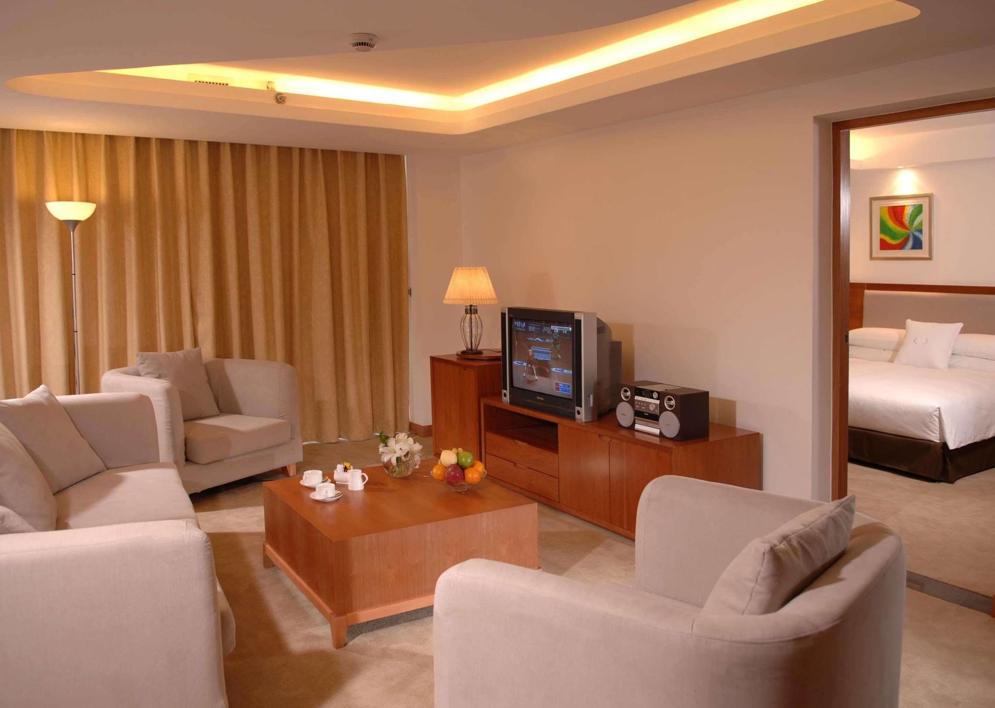 Gloria Plaza Hotel Kangqiao Шанхай Стая снимка