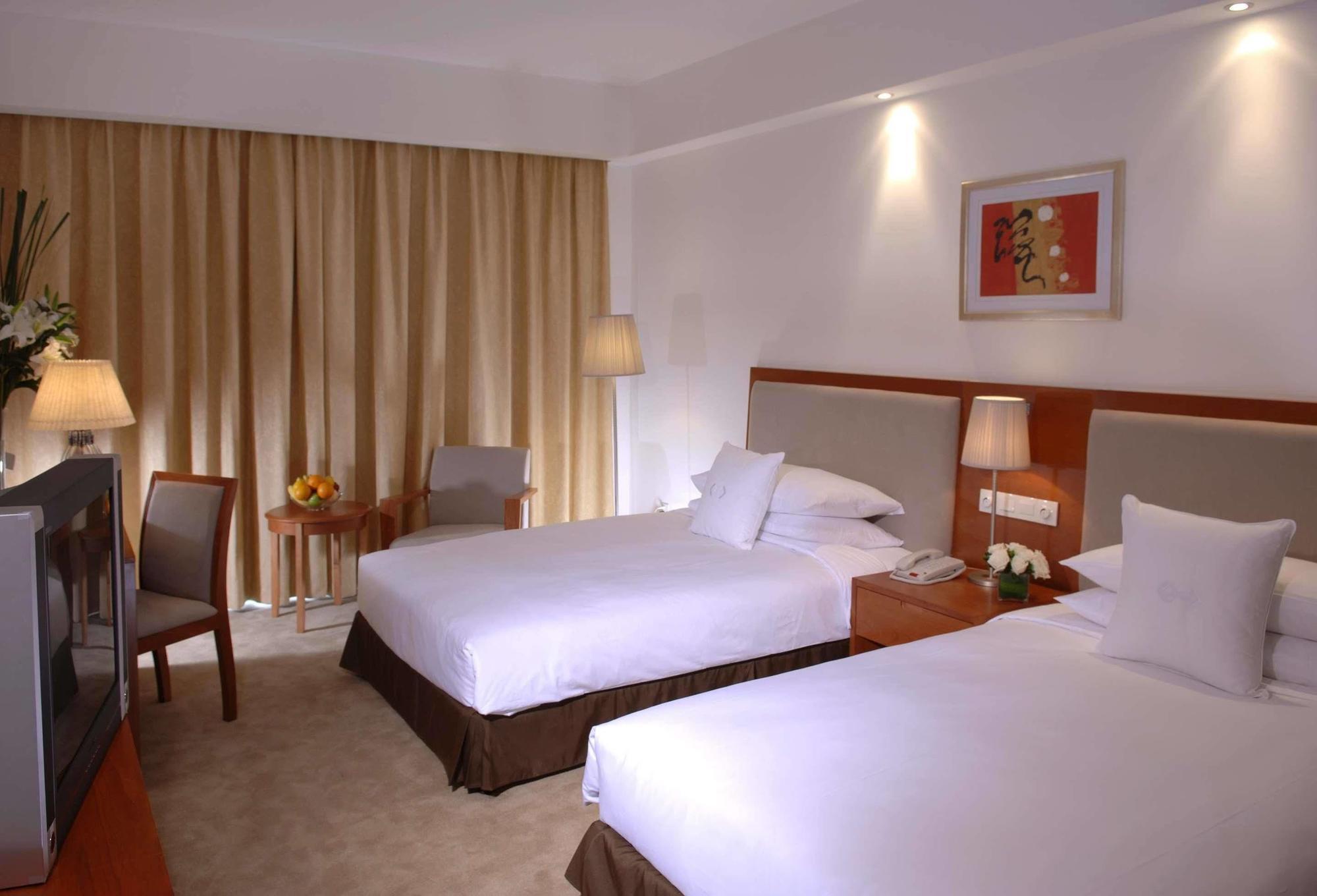 Gloria Plaza Hotel Kangqiao Шанхай Стая снимка